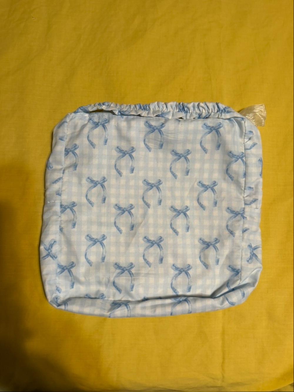White and Light Blue Bow Patterned Woman’s Toiletry Pouch